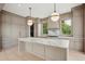 Neutral kitchen with marble countertops, stainless appliances, and spacious island at 546 Towles Crossing Dr, Johns Island, SC 29455