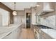 Bright kitchen with stainless appliances, marble countertops, and open concept layout at 546 Towles Crossing Dr, Johns Island, SC 29455