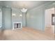 Spacious living room with fireplace, ample natural light and light wood floors at 546 Towles Crossing Dr, Johns Island, SC 29455