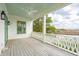 Relax on the spacious porch with a water view and a ceiling fan at 546 Towles Crossing Dr, Johns Island, SC 29455