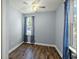 Cozy bedroom featuring wood floors, neutral walls, and a ceiling fan at 63 Guerry Cir, Goose Creek, SC 29445