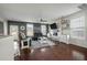 Comfortable living room with hardwood floors, a modern fireplace, and plenty of space at 7638 Haywood St, North Charleston, SC 29418
