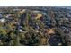 Aerial view of property and community with lush trees, golf course, and waterfront views at 764 Summerwind Cir, Edisto Beach, SC 29438