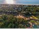 A beautiful aerial view of the community featuring tree coverage and views of the ocean at 764 Summerwind Cir, Edisto Beach, SC 29438