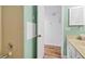 Clean bathroom featuring a tub, toilet, and a vanity, providing comfort and functionality at 764 Summerwind Cir, Edisto Beach, SC 29438