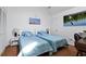 Comfortable bedroom with two beds, nautical decor, and ample closet space at 764 Summerwind Cir, Edisto Beach, SC 29438