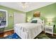Bright bedroom with a bed, natural light from the window, and a serene decor at 764 Summerwind Cir, Edisto Beach, SC 29438