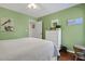 Cozy bedroom with a bed, dresser, and inviting decor for relaxation and comfort at 764 Summerwind Cir, Edisto Beach, SC 29438