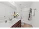 Bright bathroom featuring a vanity with a sink and a shower-tub combo at 9652 Spencer Woods Rd, Ladson, SC 29456