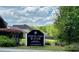 Community sign for Spencer Creek Woods, a Gathering community with covenants and restrictions at 9652 Spencer Woods Rd, Ladson, SC 29456