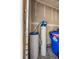 Garage interior showing water filtration and water softner system at 9652 Spencer Woods Rd, Ladson, SC 29456
