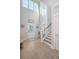 Bright foyer with staircase and views of the home's interior at 1010 Deep Gap Rd, Ridgeville, SC 29472