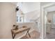 Upstairs hallway landing with a wooden desk and a view of bedroom at 1010 Deep Gap Rd, Ridgeville, SC 29472