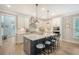 Spacious kitchen boasts a large island, pendant lighting, and stainless steel appliances at 1010 Deep Gap Rd, Ridgeville, SC 29472