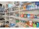 Organized pantry with metal shelving, showcasing ample storage space for food and kitchen appliances at 1010 Deep Gap Rd, Ridgeville, SC 29472