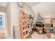 A versatile storage room featuring boxes, a ladder, an exercise machine, and an organizational solution for the entire household at 1010 Deep Gap Rd, Ridgeville, SC 29472