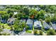 Charming two-story home featuring a welcoming front porch and surrounded by lush greenery at 1011 Ashley Ave, Charleston, SC 29403