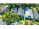 Beautiful home showcasing its well-manicured lawn and neighborhood surrounded by lush trees at 1011 Ashley Ave, Charleston, SC 29403