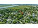 Overhead view of a neighborhood street lined with mature trees, cozy homes, and sidewalks at 1011 Ashley Ave, Charleston, SC 29403