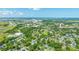 Extensive aerial view shows the density of the housing and urban landscaping, plus a distant port and waterways at 1011 Ashley Ave, Charleston, SC 29403