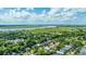 Picturesque aerial view of a residential area with marshlands and river in the distance at 1011 Ashley Ave, Charleston, SC 29403