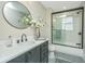 Elegant bathroom with a modern vanity, sleek fixtures, and a glass-enclosed shower for a spa-like feel at 1011 Ashley Ave, Charleston, SC 29403