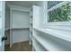 Walk-in closet featuring custom shelving and storage at 1011 Ashley Ave, Charleston, SC 29403