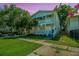 Charming two-story home featuring double porches and a beautifully landscaped yard, perfect for relaxing outdoors at 1011 Ashley Ave, Charleston, SC 29403