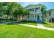 Charming two-story home with a well-manicured lawn and inviting curb appeal at 1011 Ashley Ave, Charleston, SC 29403
