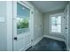 Practical laundry room with a view, featuring a window and a door to the outside at 1011 Ashley Ave, Charleston, SC 29403