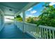 Comfortable porch with a blue ceiling and picturesque views of the neighborhood at 1011 Ashley Ave, Charleston, SC 29403
