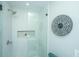 Elegant glass shower with tile surround and niche, showcasing modern bathroom design and functionality at 1011 Ashley Ave, Charleston, SC 29403