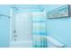 Bathroom with blue walls, shower with blue and white curtain, and a toilet at 1022 Basildon Rd, Mount Pleasant, SC 29466