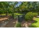 Charming community garden with planting beds, perfect for growing your own herbs and vegetables at 1022 Basildon Rd, Mount Pleasant, SC 29466