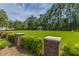Enjoy lush community green space with a gazebo and colorful Adirondack chairs for outdoor relaxation at 1022 Basildon Rd, Mount Pleasant, SC 29466