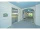 Well-lit hallway featuring an elevator and access to the units. Clean and well-maintained at 1022 Basildon Rd, Mount Pleasant, SC 29466