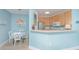 Cozy kitchen with breakfast bar and views into the dining area, ample natural light at 1022 Basildon Rd, Mount Pleasant, SC 29466