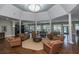 Comfortable lounge area with cozy seating around a round coffee table at 1022 Basildon Rd, Mount Pleasant, SC 29466