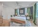 Serene bedroom with a ceiling fan, soothing wall color, and plenty of natural light at 1032 Avenue Of Oaks, Charleston, SC 29407