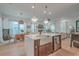 Open-concept kitchen seamlessly connects to the living room and dining area, creating a spacious and inviting atmosphere at 1032 Avenue Of Oaks, Charleston, SC 29407
