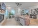 Stylish living room boasts modern decor, a cozy fireplace, and ample natural light, creating an inviting space at 1032 Avenue Of Oaks, Charleston, SC 29407