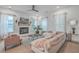 Inviting living room with a fireplace, plush seating, and natural light, creating a cozy and relaxing atmosphere at 1032 Avenue Of Oaks, Charleston, SC 29407