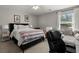 Bedroom with a bed, desk, window seat, ceiling fan, and carpeted floors at 106 Abigale Ln, Summerville, SC 29483