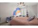Adorable bedroom with rainbow wall art and canopy at 106 Abigale Ln, Summerville, SC 29483