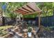 Outdoor deck featuring a metal table, chairs, and potted plants at 106 Abigale Ln, Summerville, SC 29483