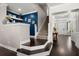 Inviting foyer with hardwood floors, a staircase, and stylish decor at 106 Abigale Ln, Summerville, SC 29483
