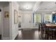 Inviting entryway with hardwood floors and decorative wall trim at 106 Abigale Ln, Summerville, SC 29483