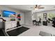 Functional home gym with treadmill, desk, and wall-mounted TV at 106 Abigale Ln, Summerville, SC 29483