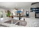Modern kitchen featuring granite countertops, stainless steel sink, and stylish black faucet at 106 Abigale Ln, Summerville, SC 29483