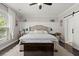 Comfortable main bedroom with king-sized bed, bedside tables, and modern decor at 106 Abigale Ln, Summerville, SC 29483